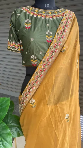 Light orange organza saree with silk embroidery blouse