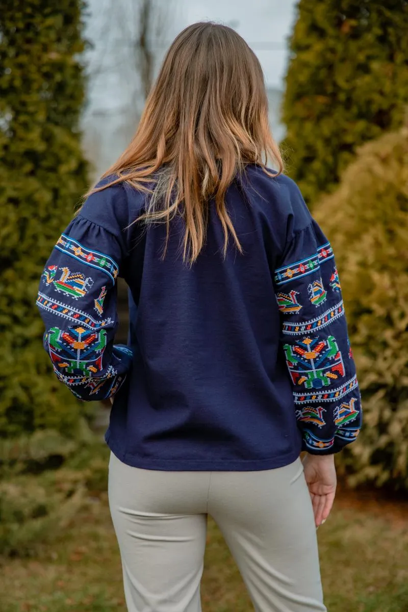 Women's blouse with ethnic embroidery